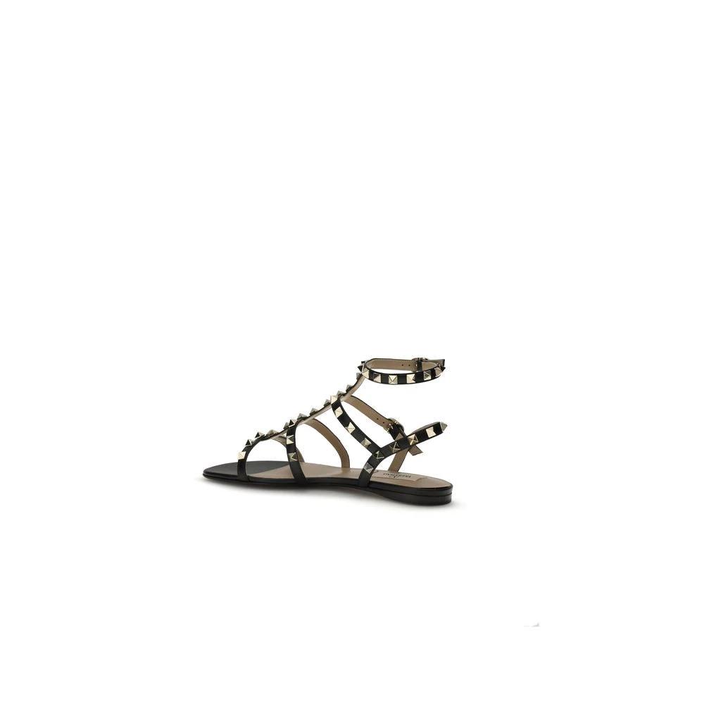 Valentino Garavani Black Calf Leather Bos Taurus Flat Sandals by Valentino Garavani