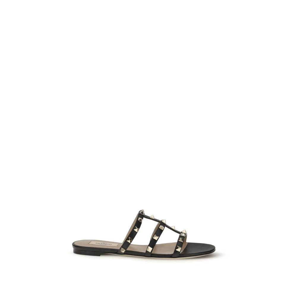 Valentino Garavani Black Calf Leather Bos Taurus Flat Sandals by Valentino Garavani