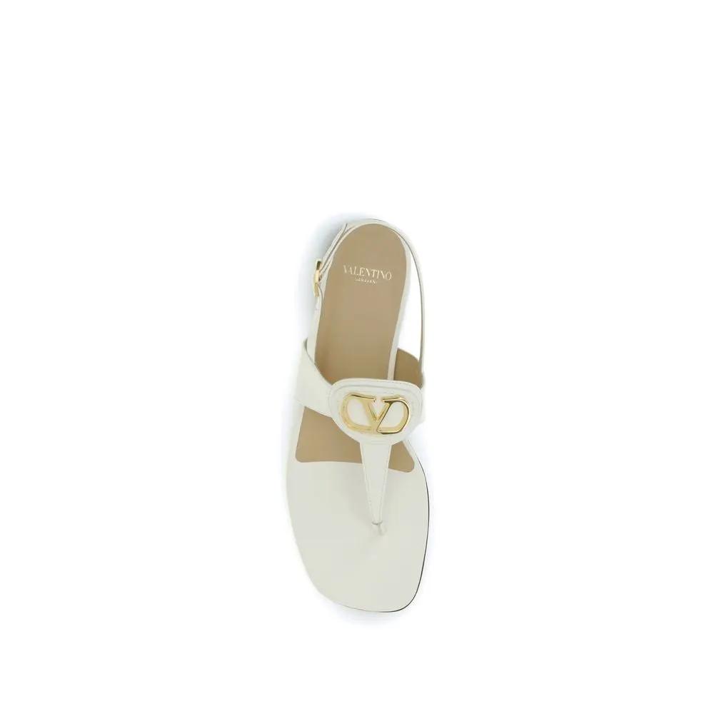 Sandales plates Valentino Garavani Bos Taurus en cuir de veau beige