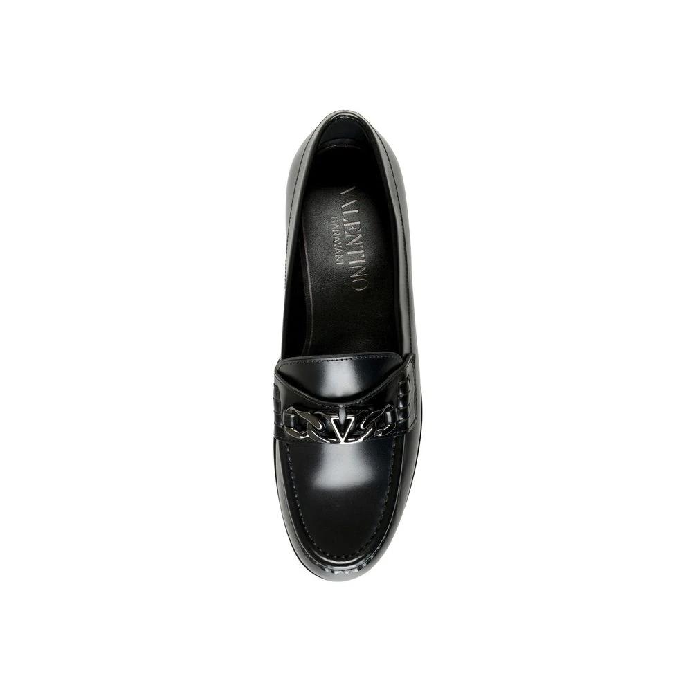 Valentino Garavani Black Leather Slip-On Loafers by Valentino Garavani