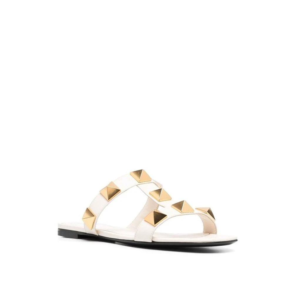 Valentino Garavani White Calfskin Flat Sandals by Valentino Garavani