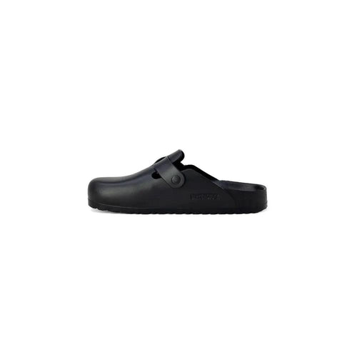 Pantoufles Birkenstock en cuir synthétique noir