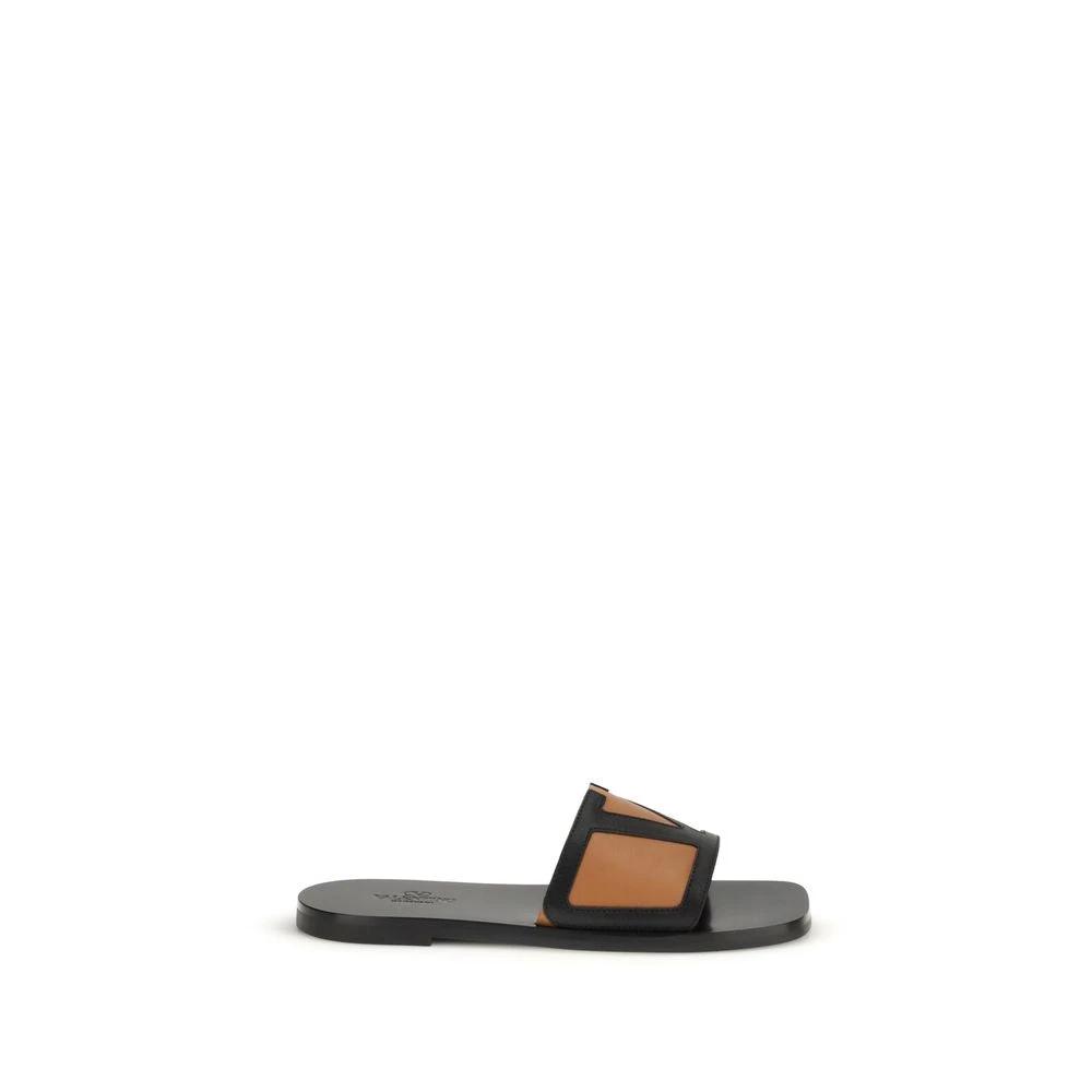 Valentino Garavani Black Calf Leather Bos Taurus Flat Sandals by Valentino Garavani