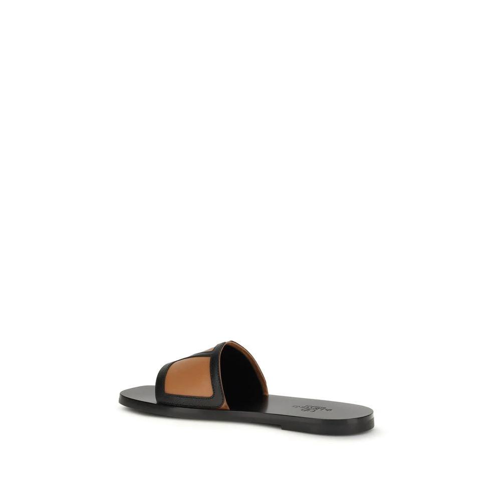 Valentino Garavani Black Calf Leather Bos Taurus Flat Sandals by Valentino Garavani