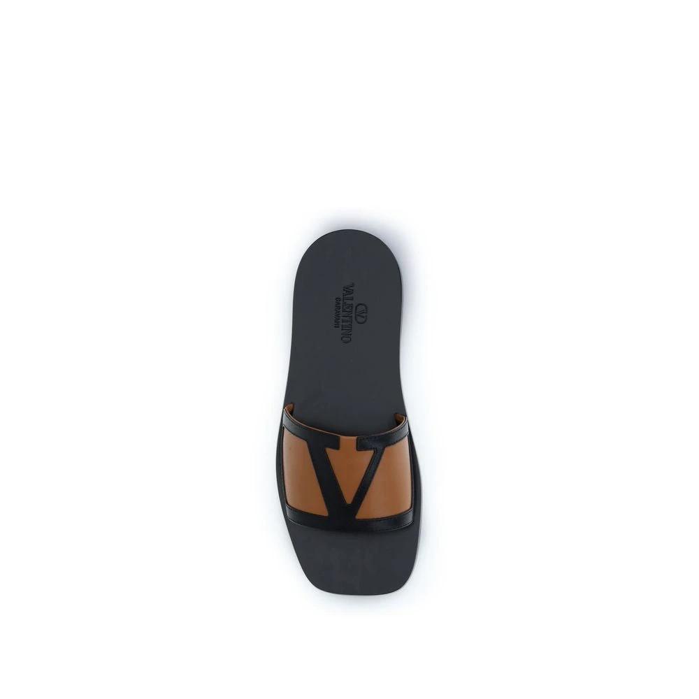 Valentino Garavani Black Calf Leather Bos Taurus Flat Sandals by Valentino Garavani