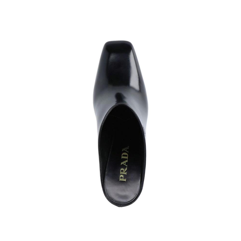 Mules Prada en cuir de veau noir