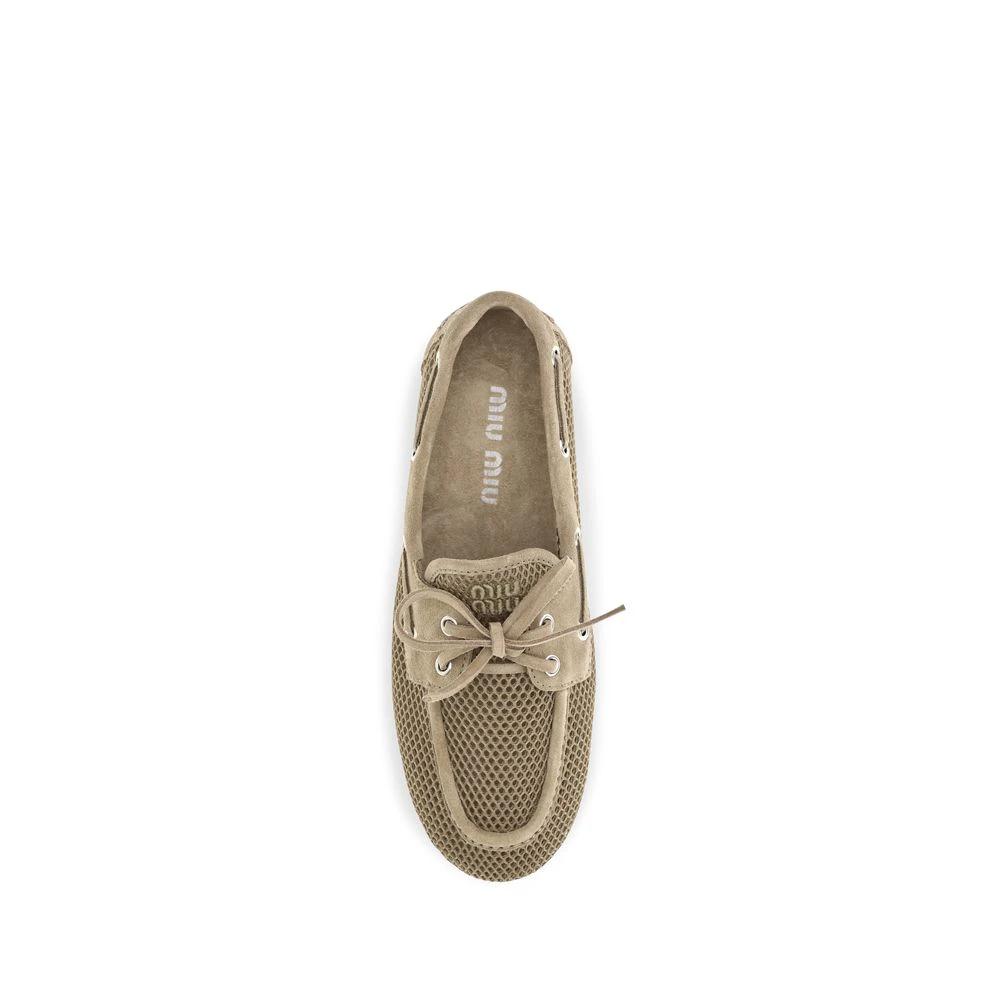 Miu Miu Beige Calf Leather Bos Taurus Slip-On Loafers by Miu Miu
