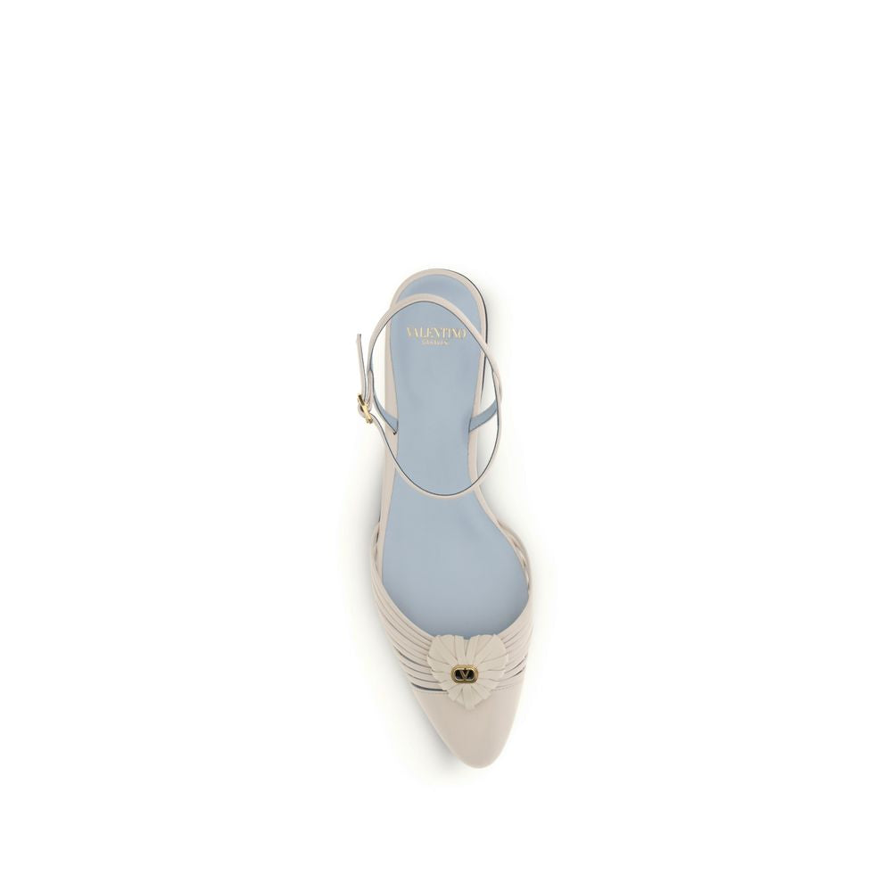 Sandales plates Valentino Garavani en cuir de chèvre beige