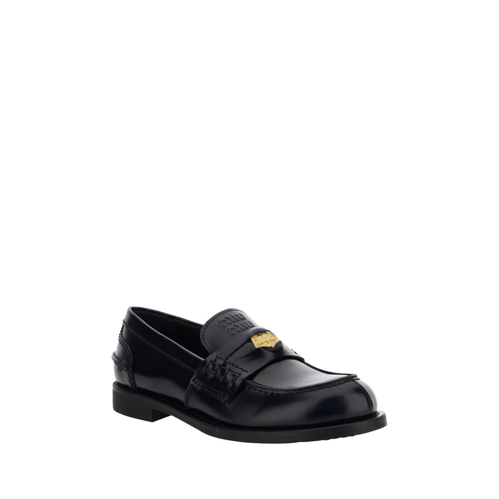 Mocassins Miu Miu en caoutchouc noir