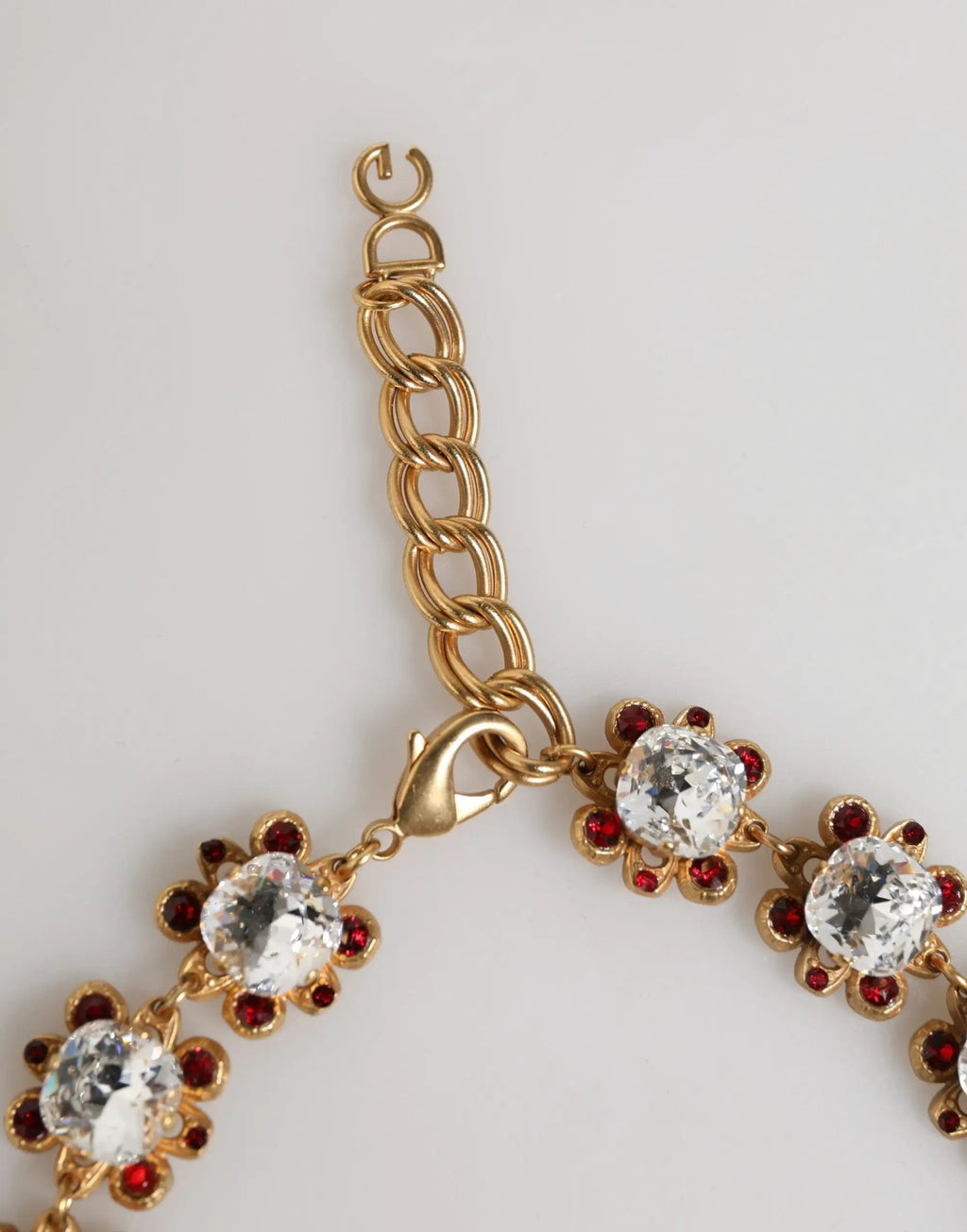 Collier Dolce &amp; Gabbana en laiton doré avec pendentifs FRUIT, fleurs et logo en cristal