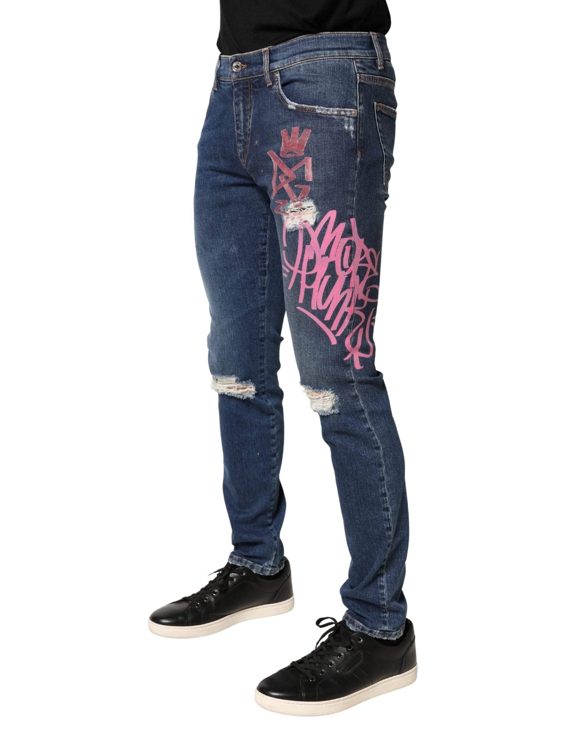 Jean skinny bleu délavé à imprimé graffiti Dolce &amp; Gabbana