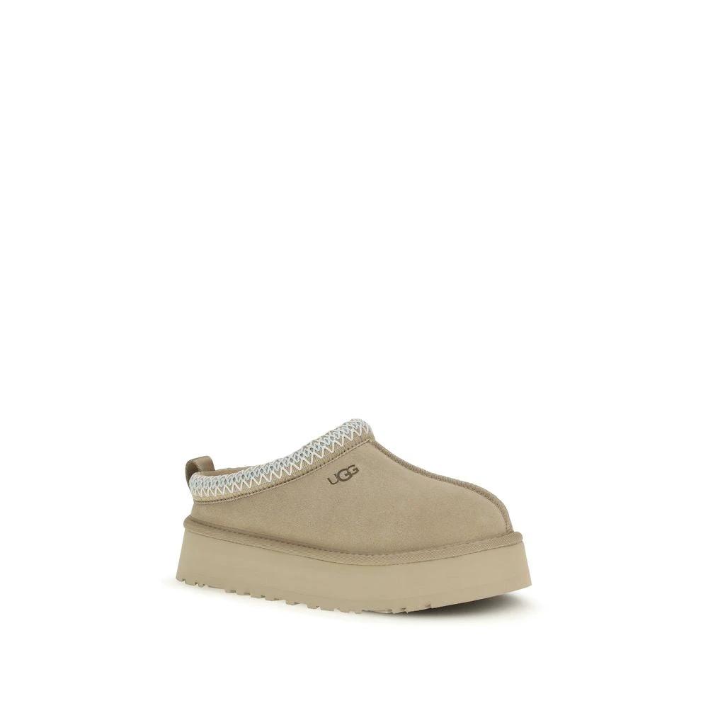 Mules UGG Bos Taurus en cuir de veau beige