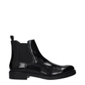Boots homme en cuir noir – Bottines minimalistes Prada
