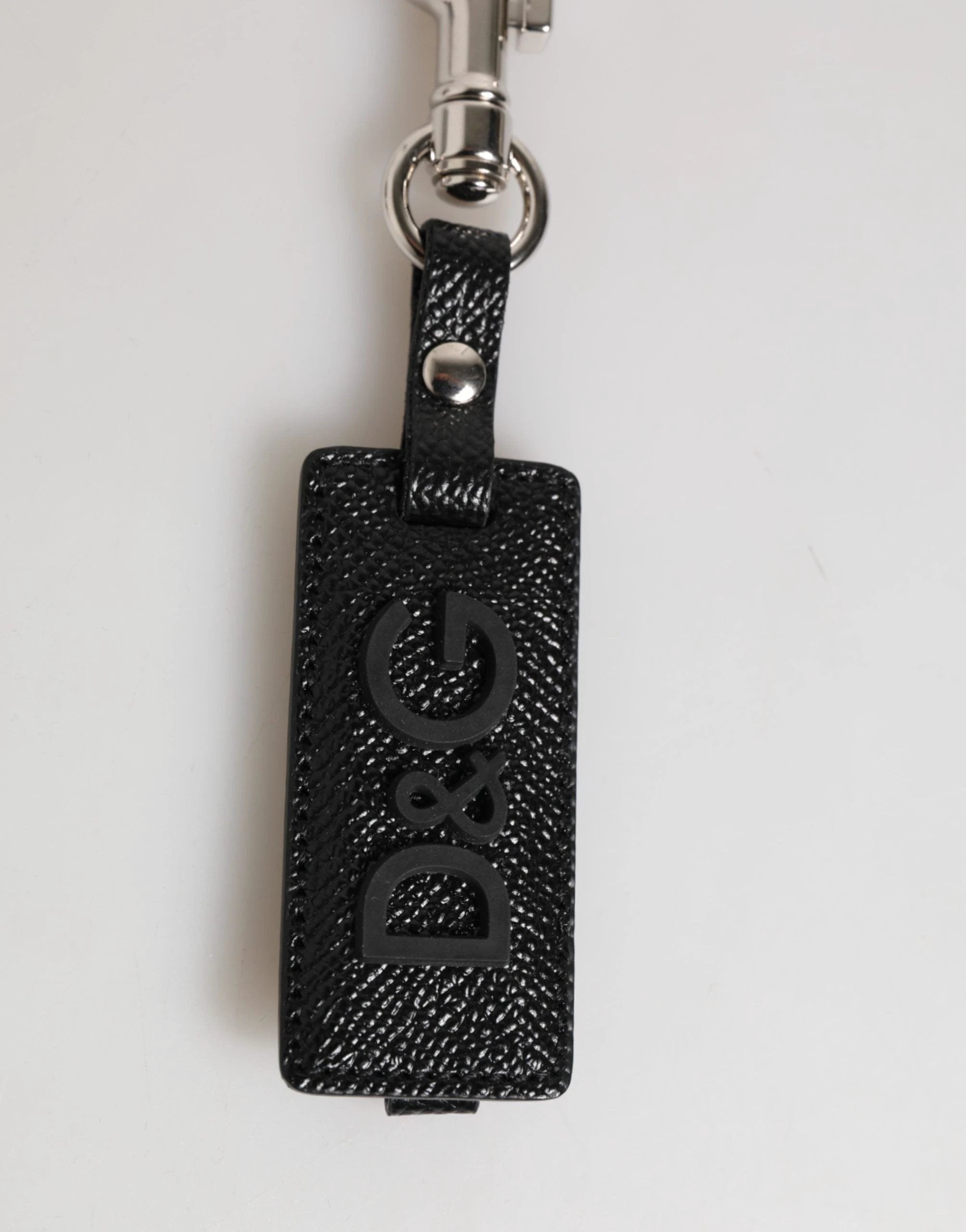 Porte-clés homme Dolce & Gabbana en cuir noir avec logo DG et métal argenté