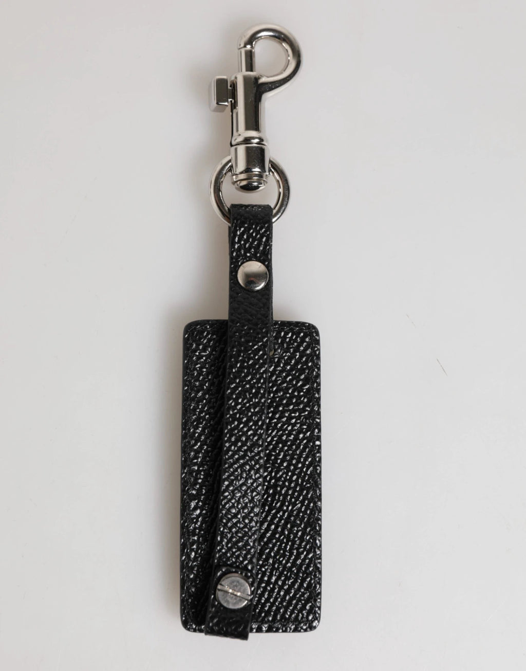 Porte-clés homme Dolce & Gabbana en cuir noir avec logo DG et métal argenté