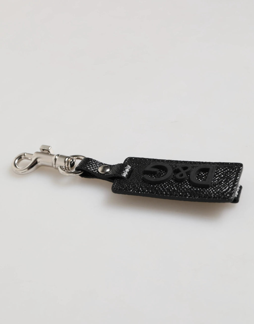 Porte-clés homme Dolce & Gabbana en cuir noir avec logo DG et métal argenté