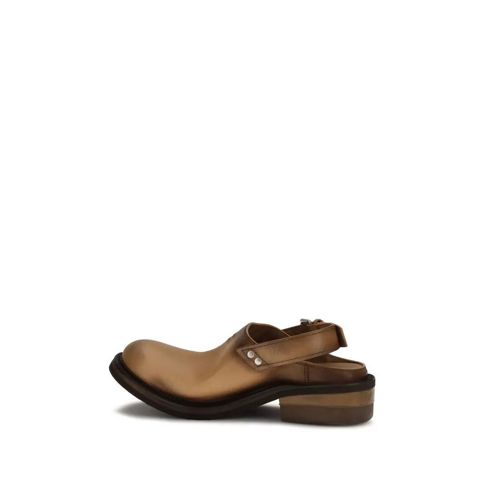 Mules Bos Taurus en cuir de veau marron Miu Miu