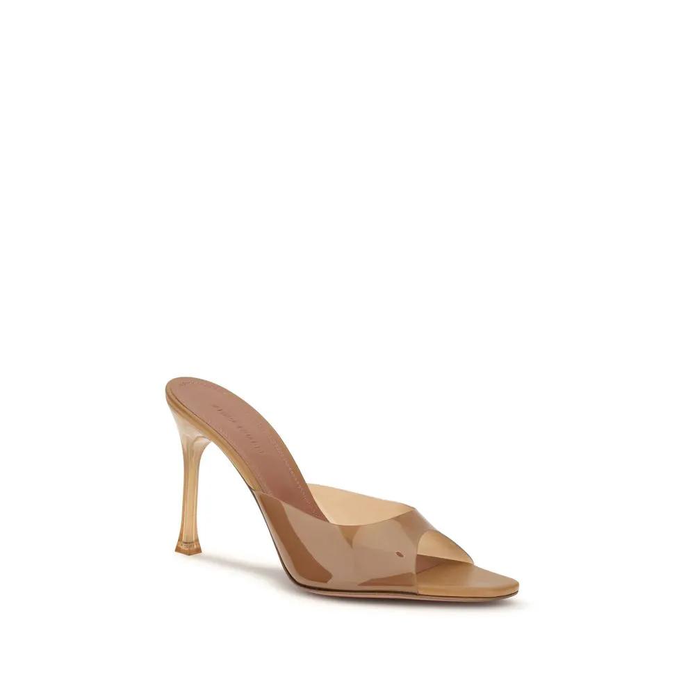 Sandales Amina Muaddi en PVC beige à talon aiguille