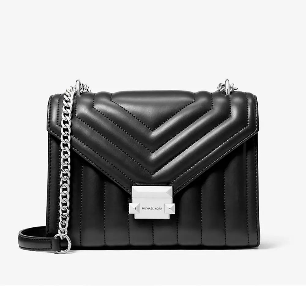 Sac à bandoulière en fausse fourrure noire Michael Kors