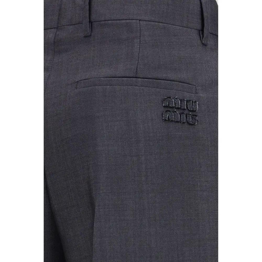 Pantalon de costume Oves Aries en laine grise Miu Miu