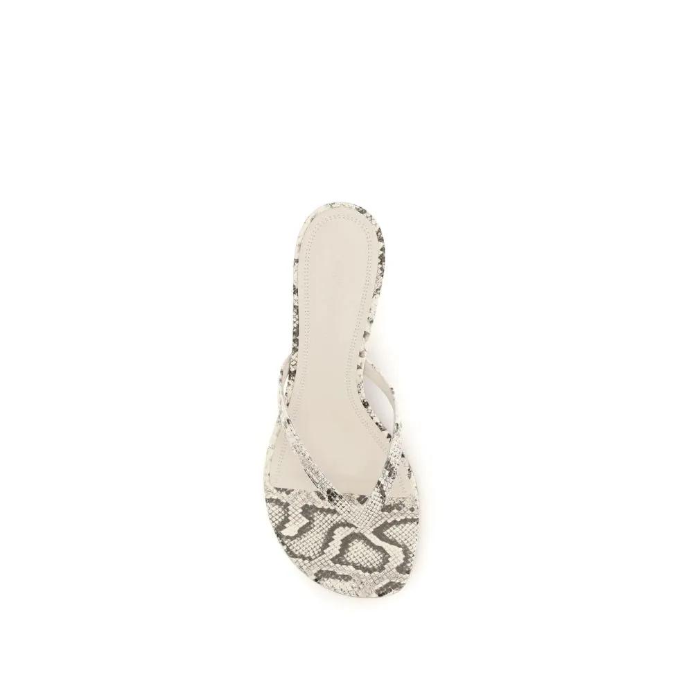 Sandales plates Amina Muaddi en cuir de veau gris
