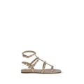 Valentino Garavani Sandales plates en cuir de veau rose Bos Taurus