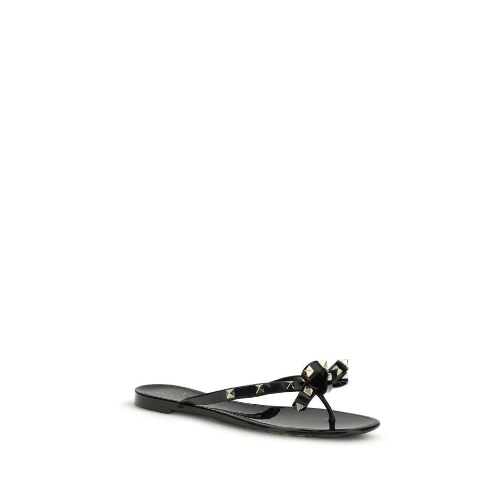 Valentino Garavani Sandales plates noires en PVC