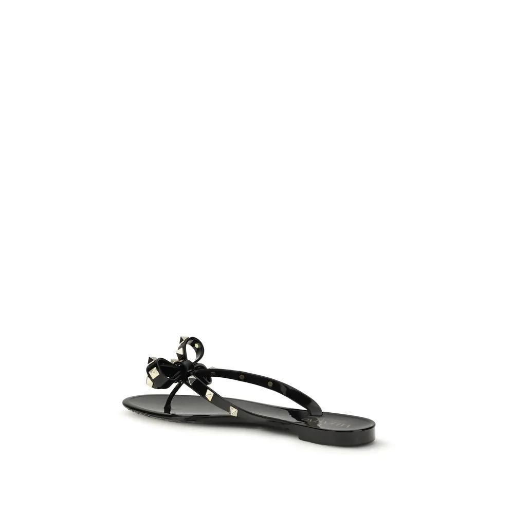 Valentino Garavani Sandales plates noires en PVC
