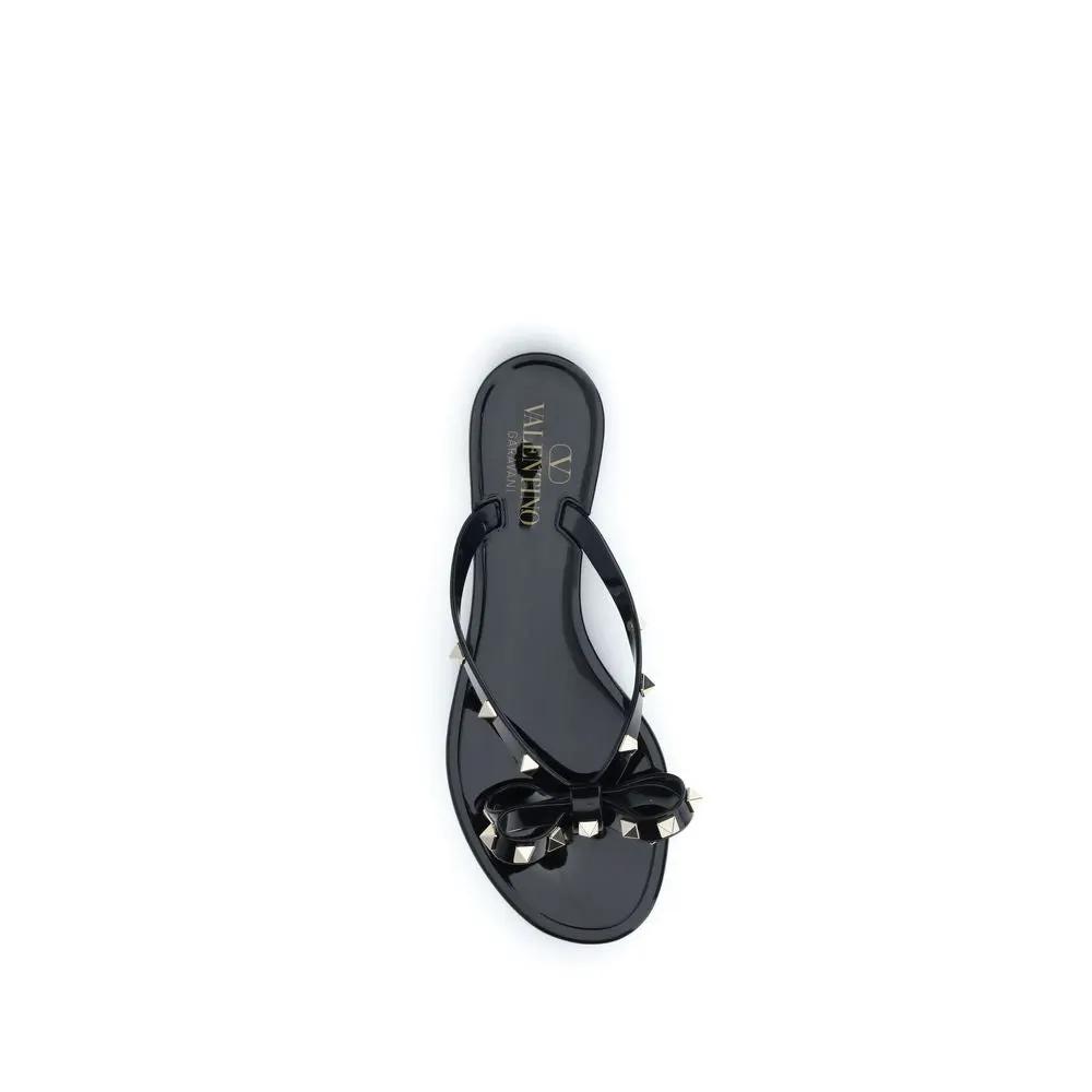 Valentino Garavani Sandales plates noires en PVC
