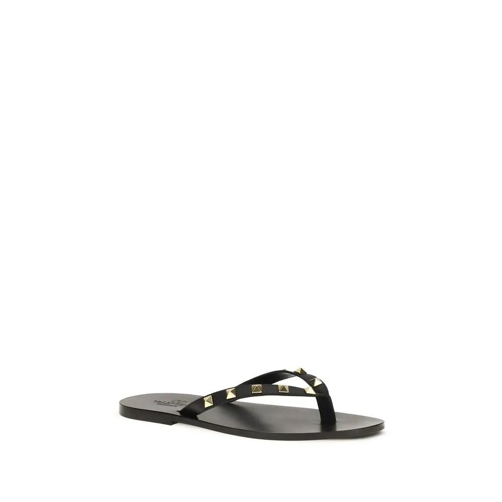 Valentino Garavani Sandales tongs en cuir de veau noir Bos Taurus