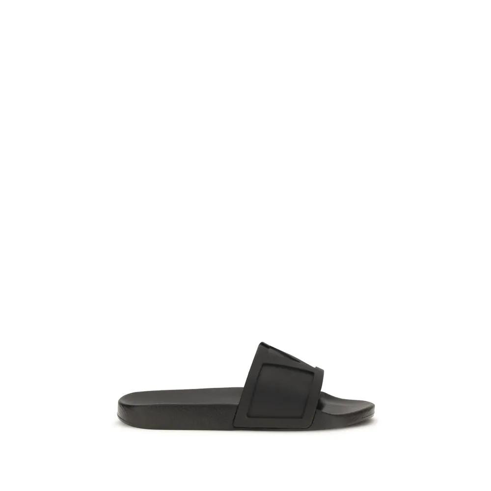 Sandales plates en caoutchouc noir Valentino Garavani