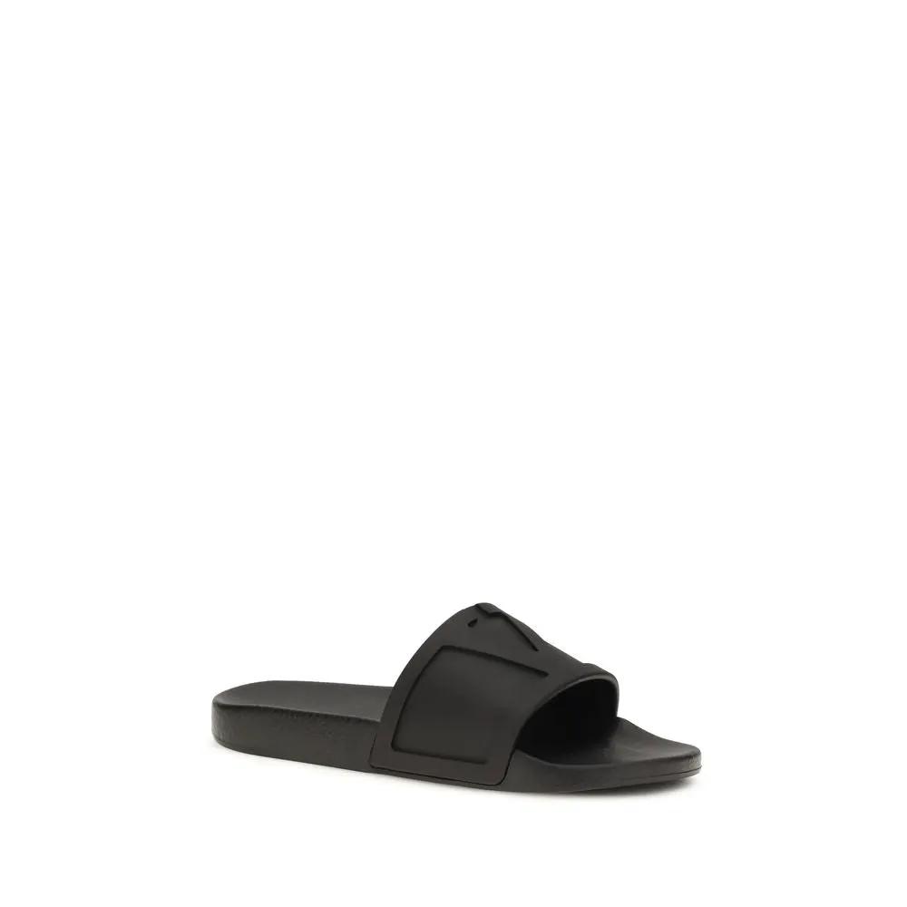 Sandales plates en caoutchouc noir Valentino Garavani