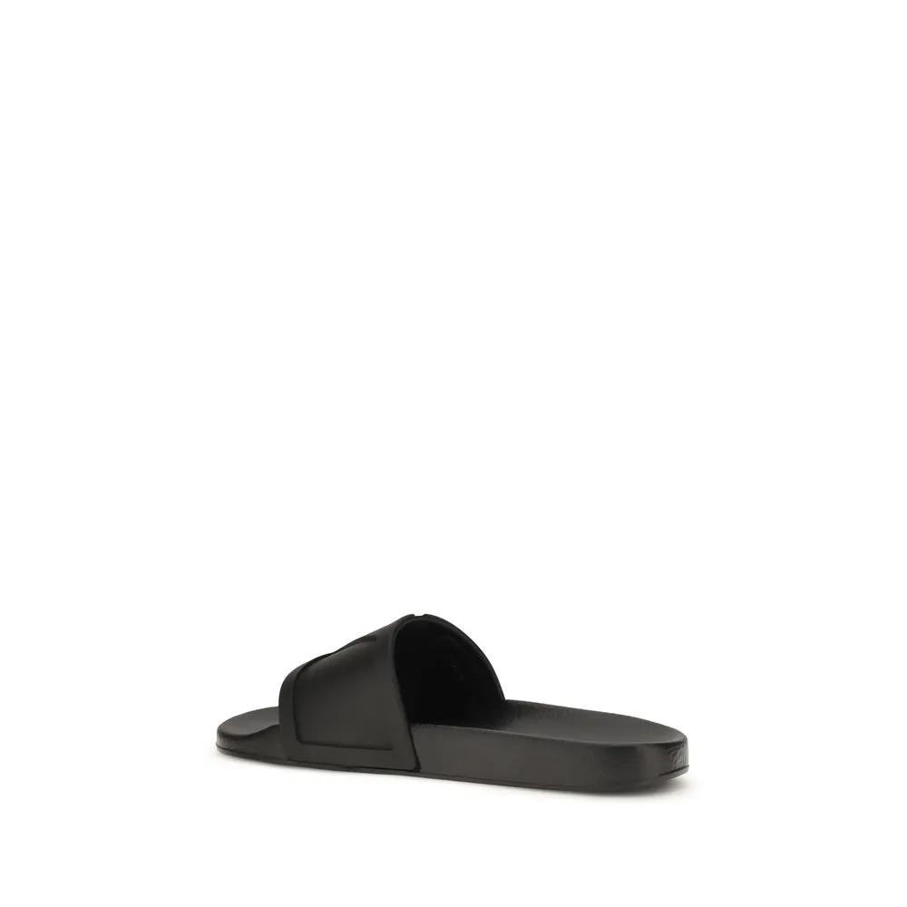 Sandales plates en caoutchouc noir Valentino Garavani