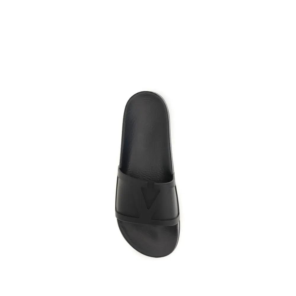 Sandales plates en caoutchouc noir Valentino Garavani