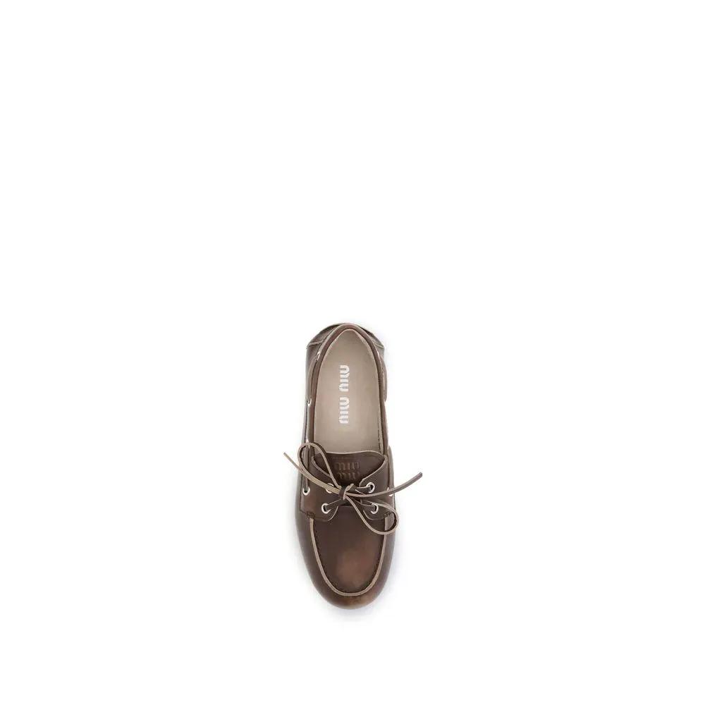 Miu Miu Miu Miu Brown Calf Leather Bos Taurus Slip-On Loafers