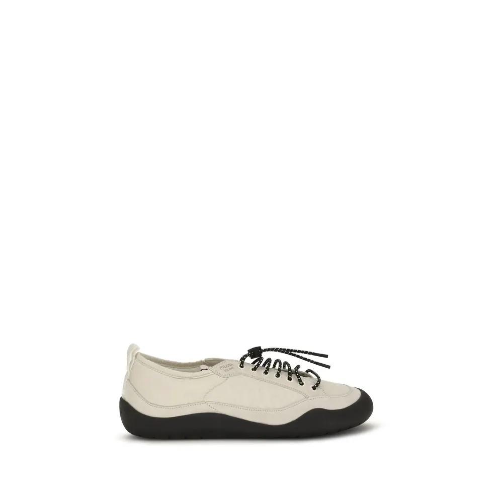 Baskets sportives en tissu beige Prada