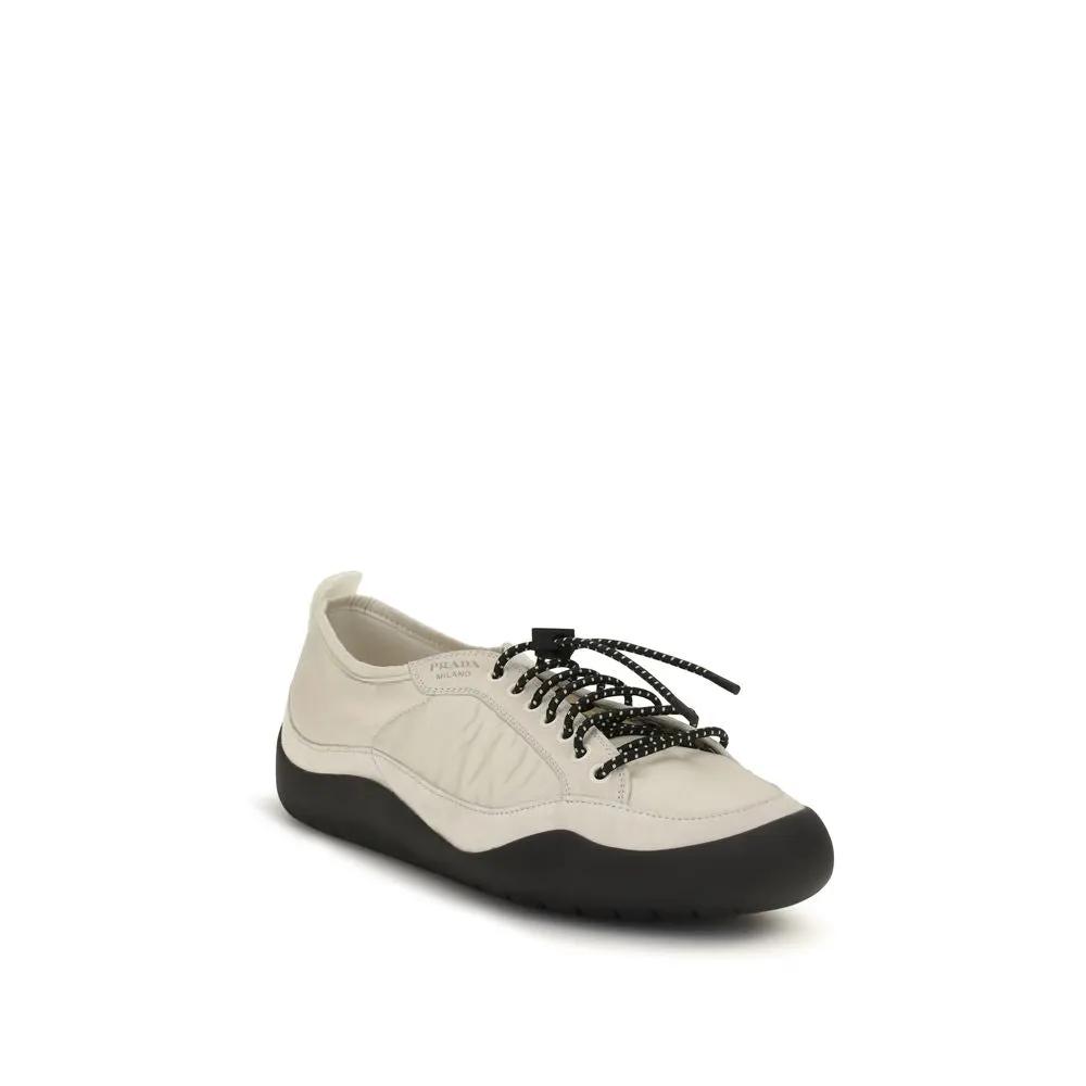 Baskets sportives en tissu beige Prada