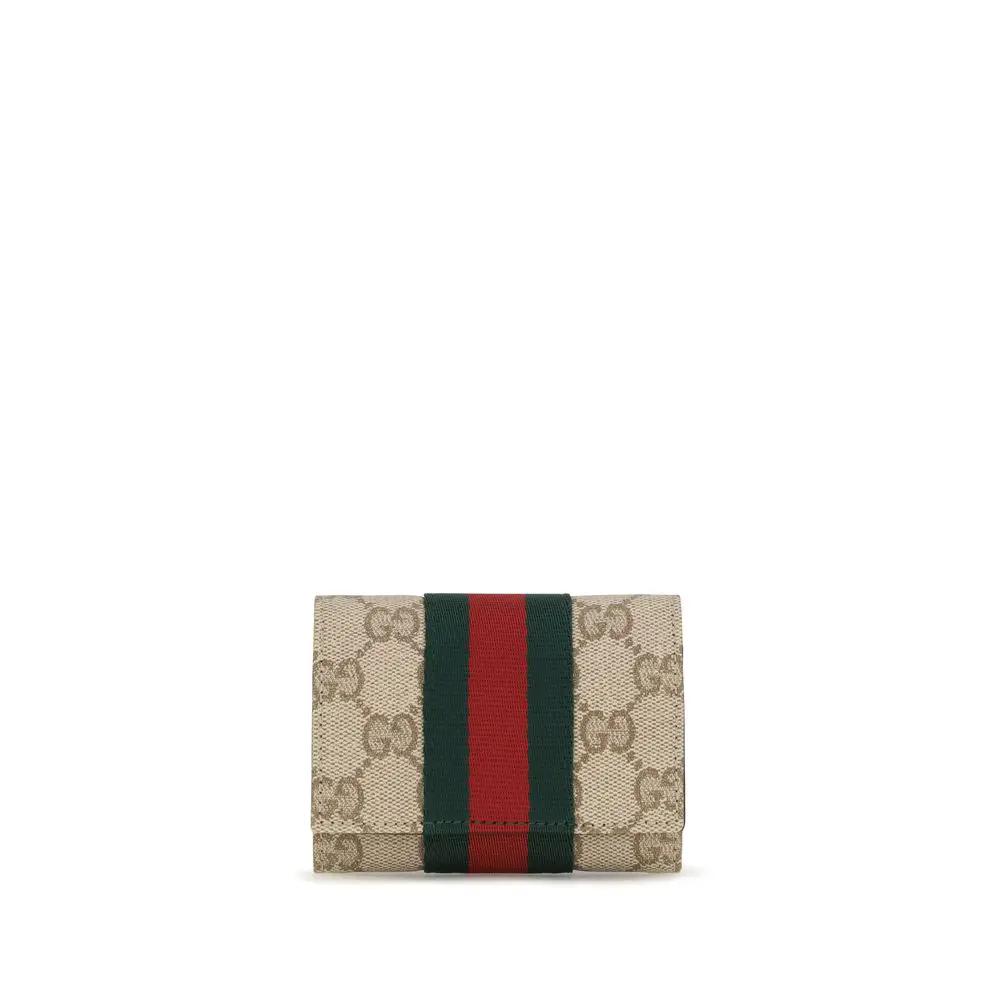 Portefeuille Gucci en toile beige