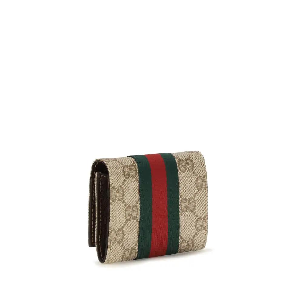 Portefeuille Gucci en toile beige