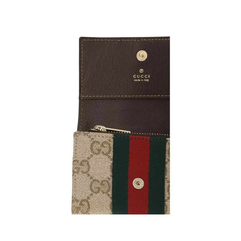 Portefeuille Gucci en toile beige