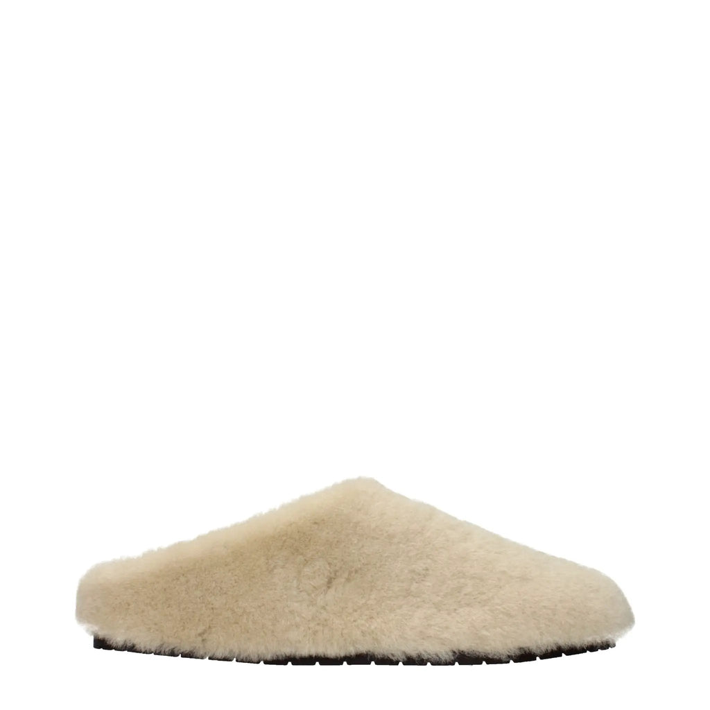 Pantoufles en fourrure beiges Prada