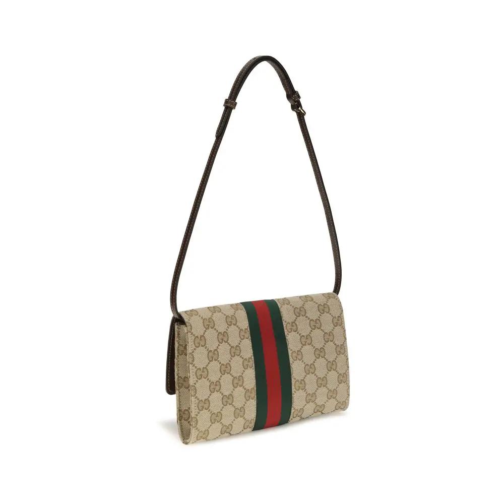 Portefeuille Gucci en tissu marron