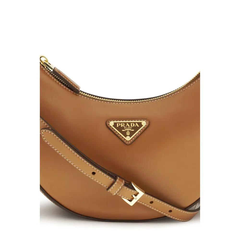 Sac bandoulière Prada Bos Taurus en cuir de veau beige