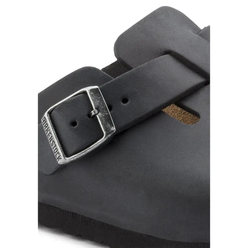 Mules Birkenstock noires en matière synthétique