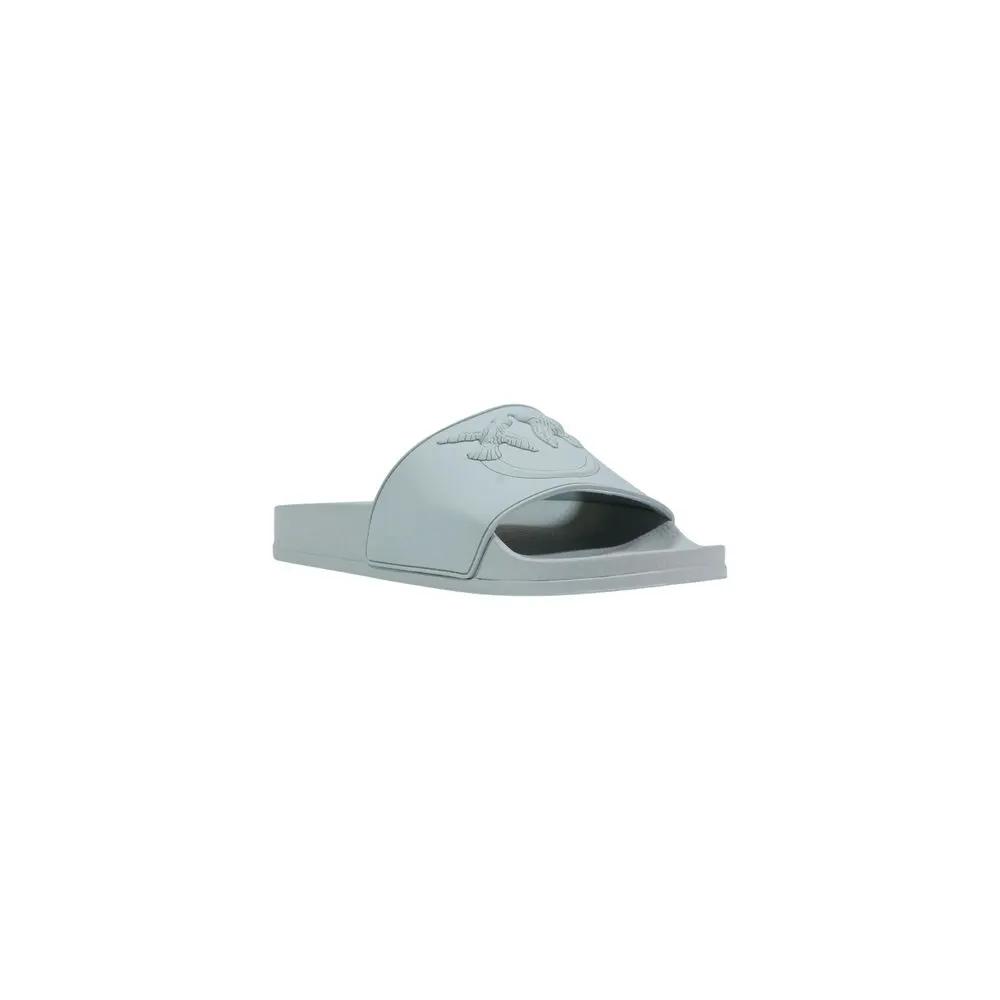 Chaussons en PVC vert PINKO