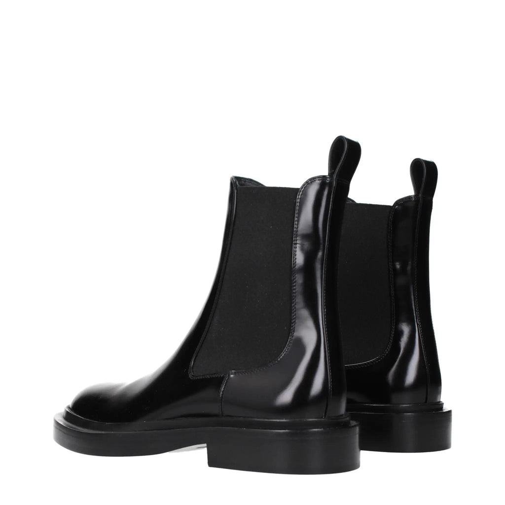 Bottes montantes en cuir noir Jil Sander