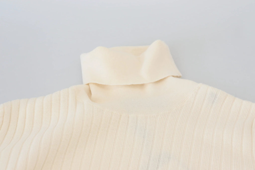 Dolce & Gabbana Ivory Turtleneck Distressed Cuff Pullover Sweater by Dolce & Gabbana