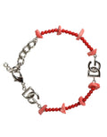 Bracelet Dolce &amp; Gabbana en laiton argenté, perles de résine et logo DG.