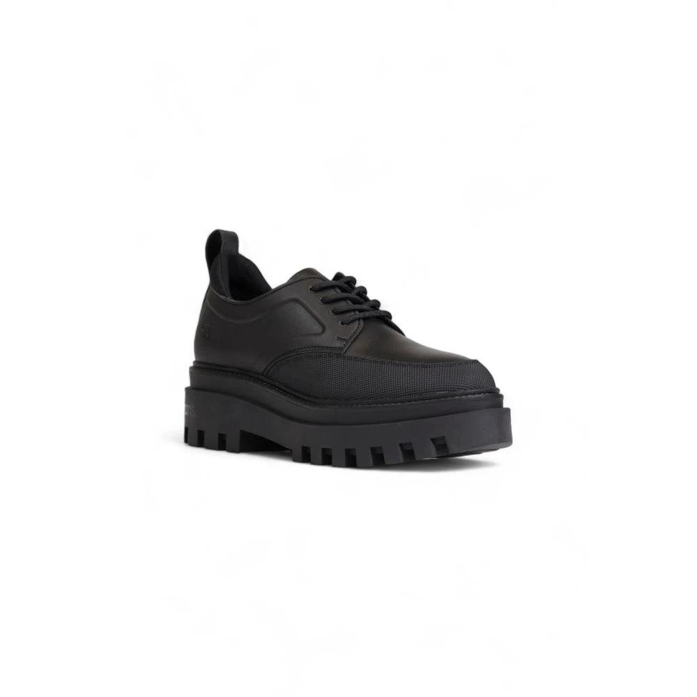 Calvin Klein Jeans Black Polyethylene Platform Pumps by Calvin Klein Jeans