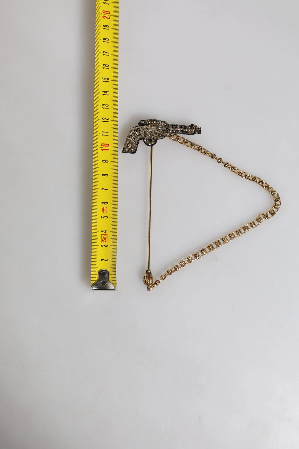Dolce & Gabbana Black Gold Brass Copper Revolver Brooch Lapel Pin by Dolce & Gabbana